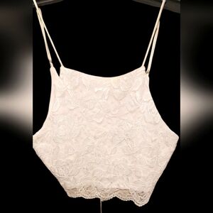 Lulu's White Sleeveless Camisole with Spaghetti Straps Crop.Read Post